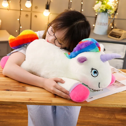 licorne peluche rose et blanche