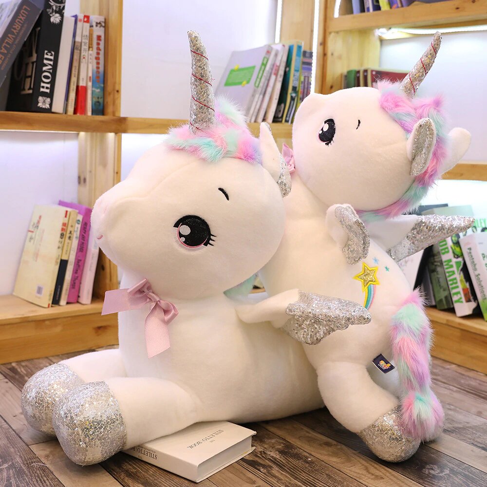 grande peluche licorne de couleur blanche