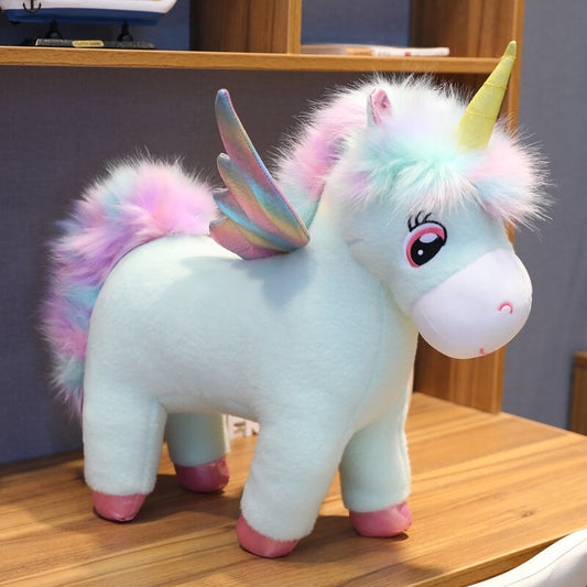 une peluche licorne avec des gros yeux