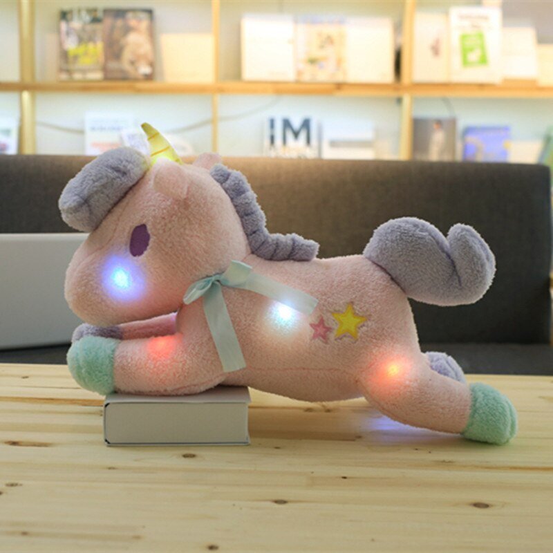 peluche licorne rose lumineuse de petite taille